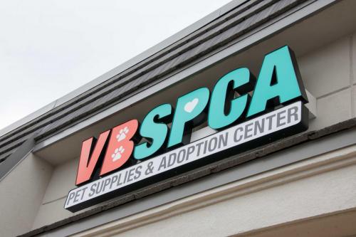 SPCA Satellite Center logo and sign
